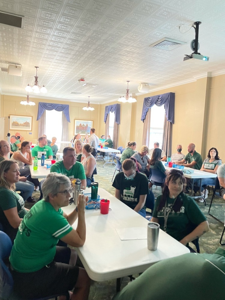 educators listening to information in conference room