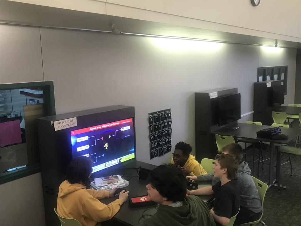 Smash club enjoying a collaboration station in our library.
